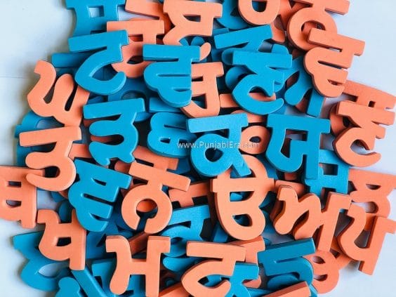 Gurmukhi alphabet magnets in orange and blue